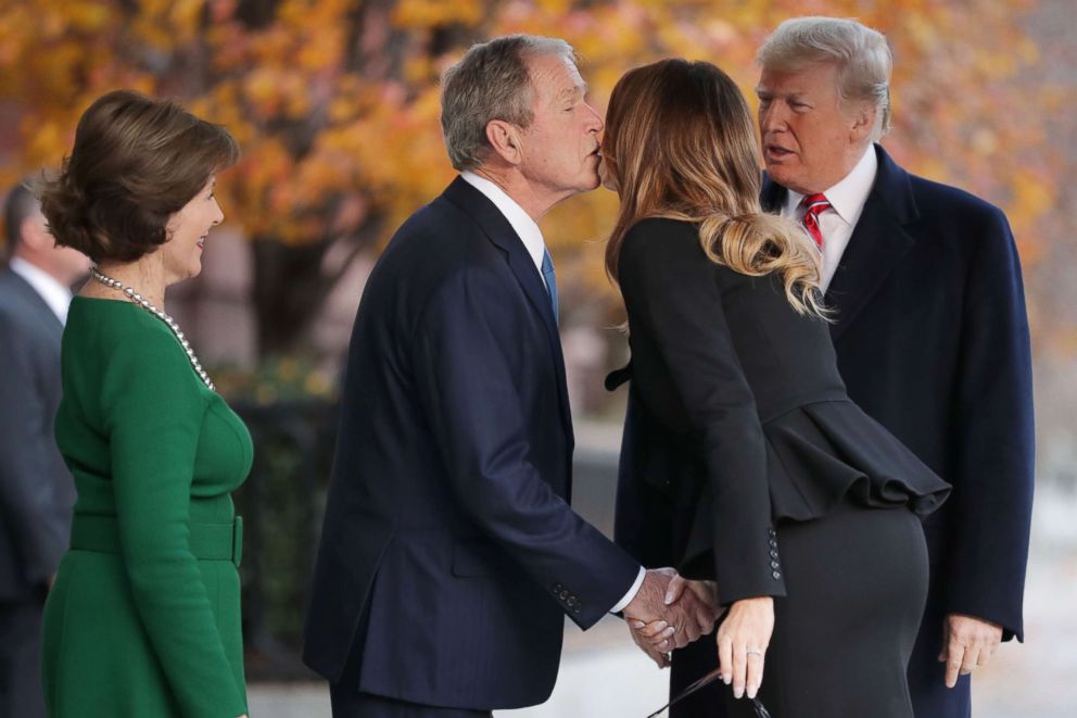 PHOTO: Former first lady Laura Bush and former President George W. Bush greet President Donald Trump and first lady Melania Trump outside of Blair House, Dec. 04, 2018 in Washington.