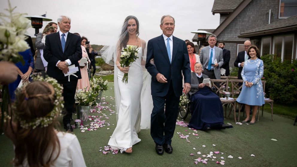 PHOTO: Barbara Pierce Bush walks down the aisle with her father George W. Bush, Oct. 7, 2018.