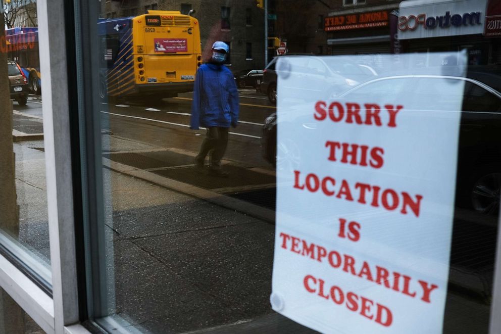 PHOTO: A sign alerts customers that a business in Queens, which has one of the highest infection rates of coronavirus in the nation, is closed on April 03, 2020, in New York.