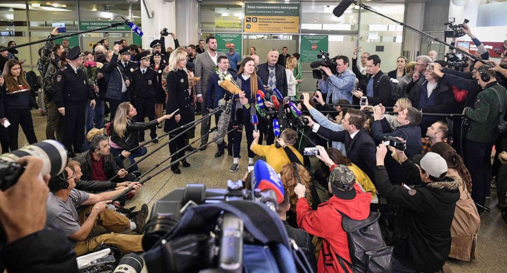 PHOTO: Maria Butina talks to the press as she arrives at Moscows Sheremetyevo airport Oct. 26, 2019.