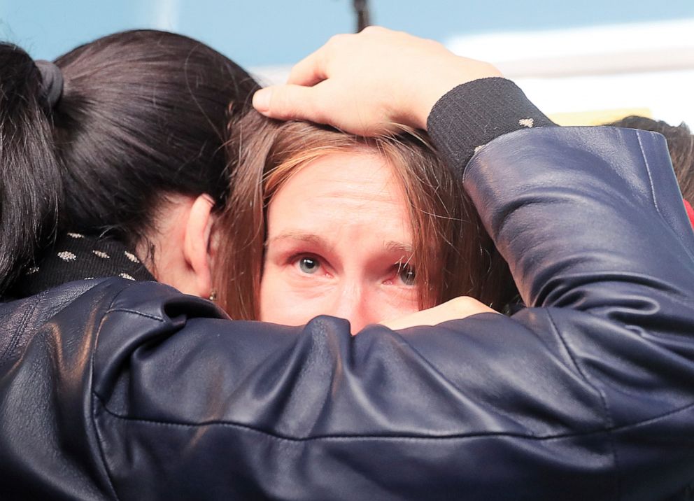 PHOTO: Convicted Russian agent Maria Butina, released from a Florida prison and then deported, is welcomed by acquaintances at Sheremetyevo International Airport outside Moscow on Oct. 26, 2019.