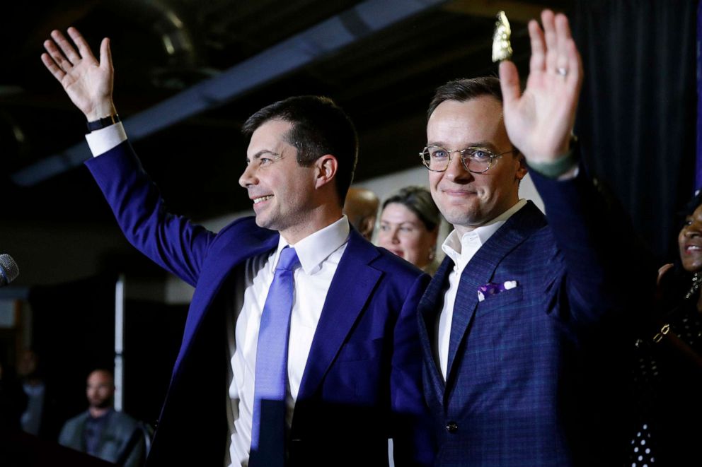 PHOTO: Democratic presidential candidate Pete Buttigieg, left, and his husband Chasten Buttigieg acknowledge supporters after speaking at a caucus night event in Las Vegas, Nev., Feb. 22, 2020.