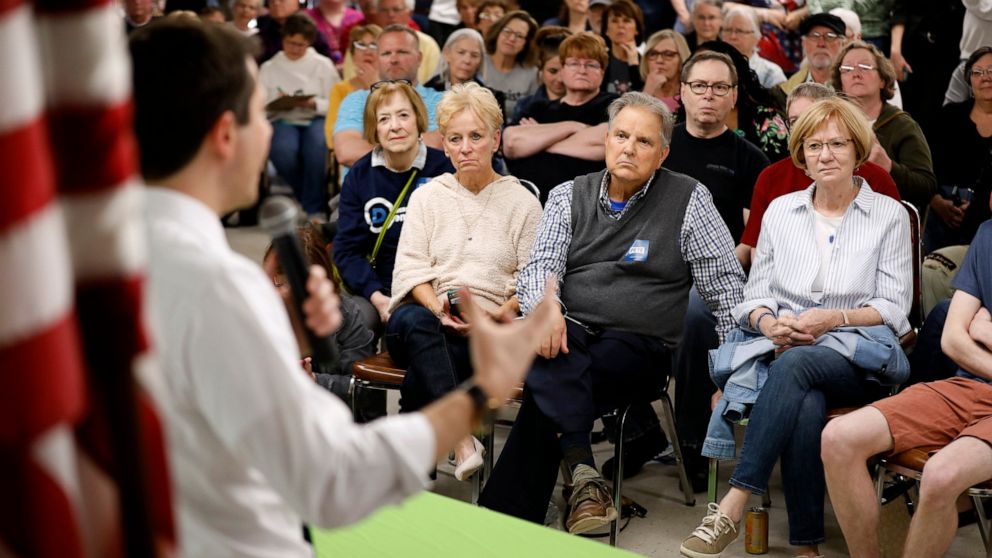 Members of the public listen to Pete Buttigieg, Democratic presidential candidate 2020 and mayor of South Bend, speaking at a public meeting on Tuesday, April 16, 2019, in Fort Dodge, Iowa. .