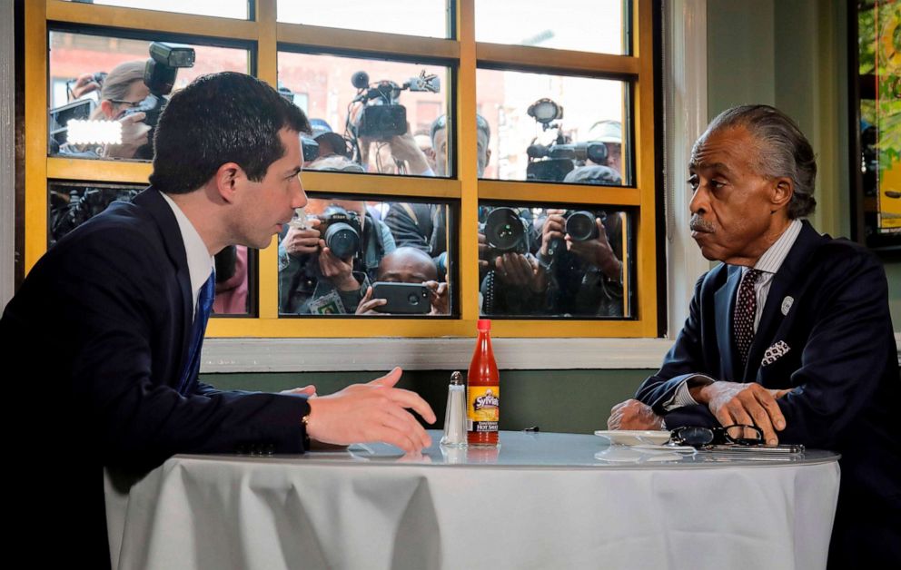 PHOTO: Democratic presidential candidate Mayor Pete Buttigieg of South Bend, Indiana and civil rights leader Rev. Al Sharpton, President of National Action Network, hold a lunch meeting at Sylvia's Restaurant in Harlem, New York, April 29, 2019.