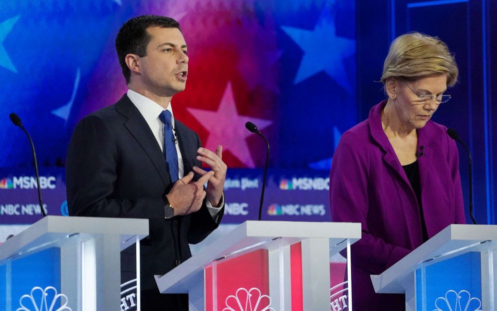 PHOTO: Democratic presidential candidate and South Bend, Indiana, Mayor Pete Buttigieg speaks as Sen. Elizabeth Warren, D-Mass., listens during the fifth 2020 campaign debate at the Tyler Perry Studios in Atlanta on Nov. 20, 2019. 