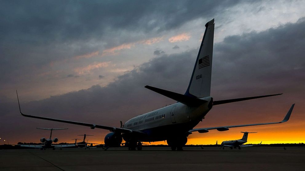 PHOTO: The sun rises behind an 89th Airlift Wing Special Airlift Mission C-40B, C-37B, C-20B and numerous transient C-5M Super Galaxies and C-17 Globemaster IIIs at Joint Base Andrews, Md., June 15, 2016.