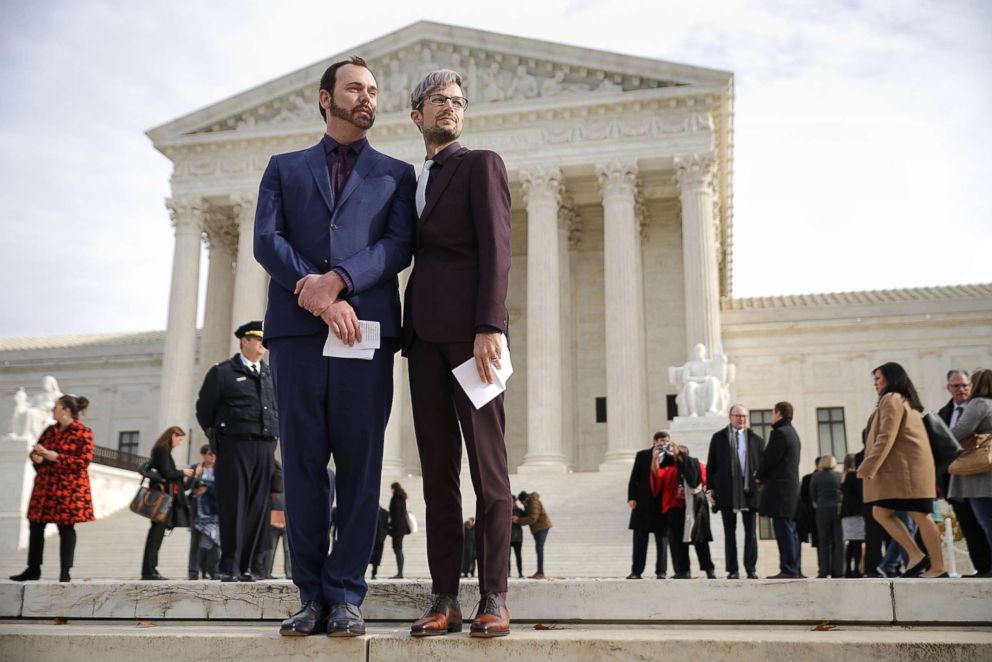 PHOTO: From left, David Mullins and Charlie Craig outside the the U.S. Supreme Court, Dec. 5, 2017 in Washington, D.C. The couple filed a complaint after  baker Jack Phillips refused to sell them a wedding cake for their same-sex ceremony. 