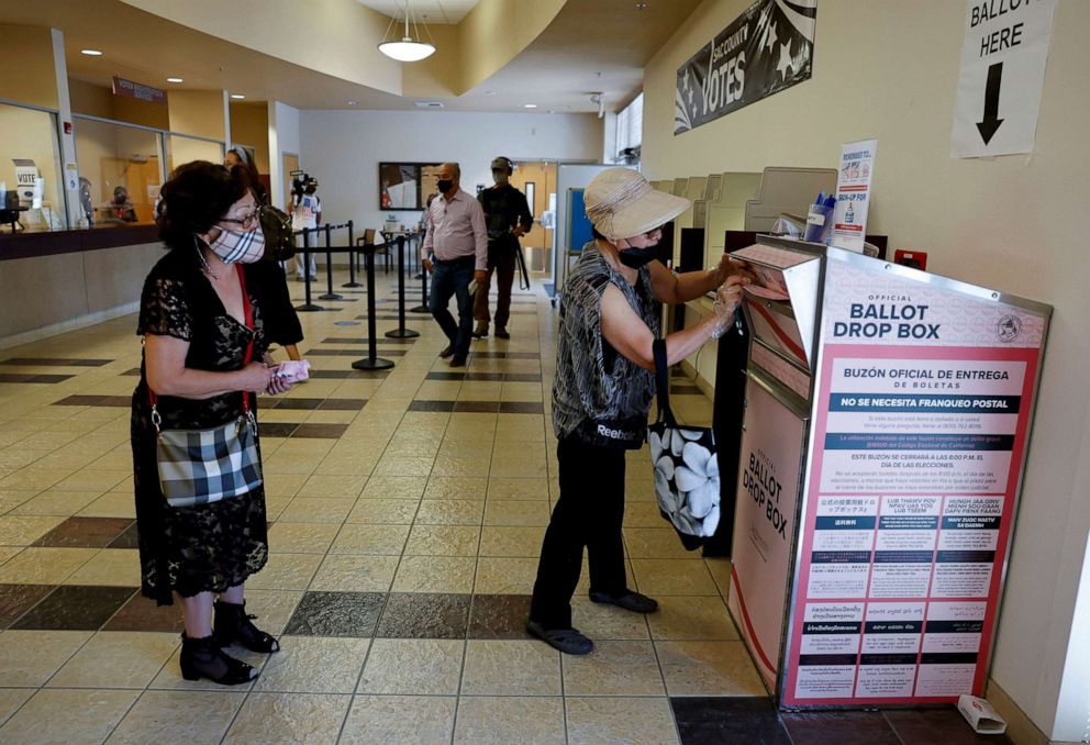 PHOTO: Voters drop off their mail-in ballots as California goes to the polls in a gubernatorial recall election, in Sacramento, Calif., Sept. 14, 2021.