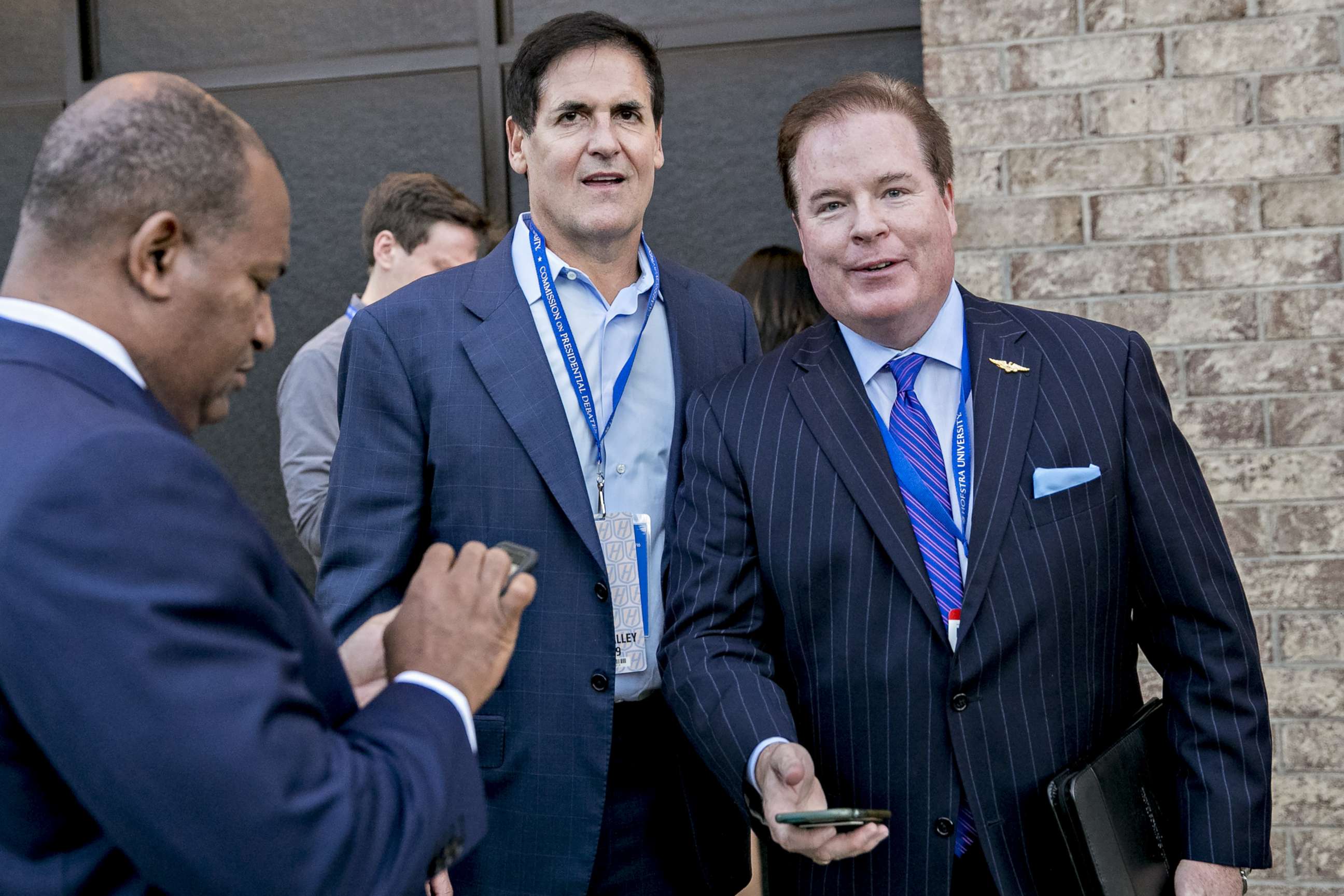 PHOTO:Stephen Calk, founder and chief executive officer of Chicago Bancorp, right, and Mark Cuban stand outside the media filing center ahead of the first presidential debate in Hempstead, New York, Sept. 26, 2016.