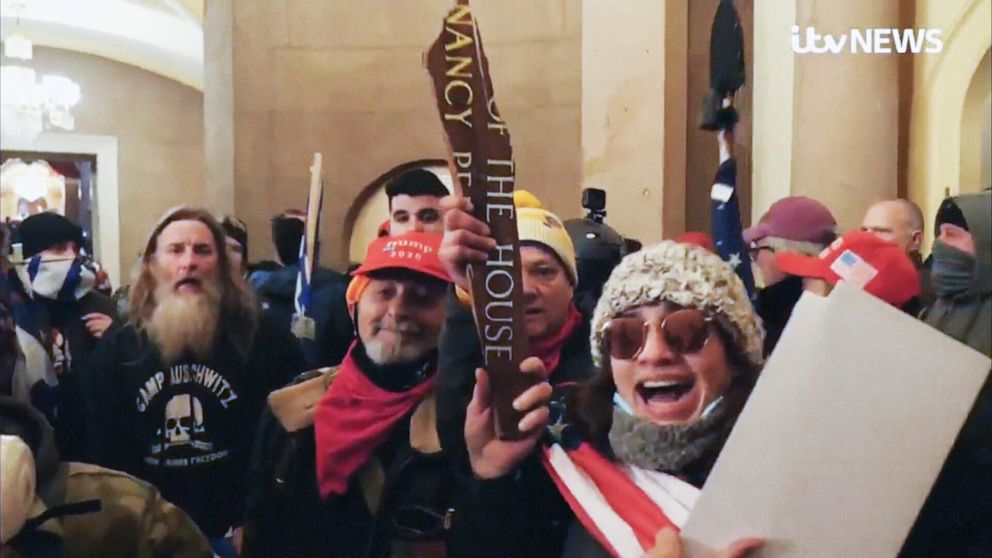 PHOTO: A man wearing a garment that reads, “Camp Auschwitz” and “Work Brings Freedom,” is pictured in an image made from ITV News video on Jan. 6, 2020, during the riot in the U.S. Capitol building in Washington, D.C.