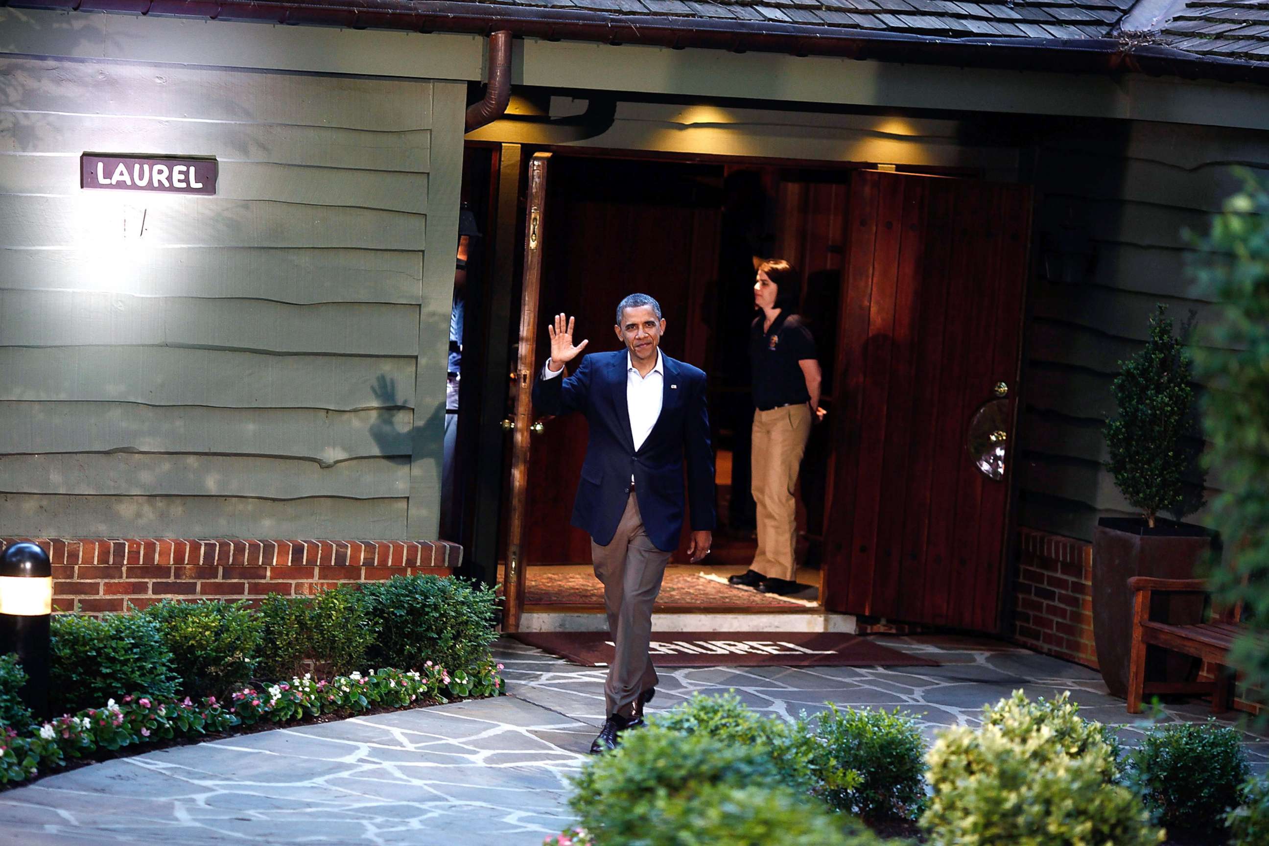 PHOTO: President Barack Obama waves to members of the media before greeting G8 leaders in front of Laurel Lodge at Camp David during the 2012 G8 Summit, May 18, 2012.