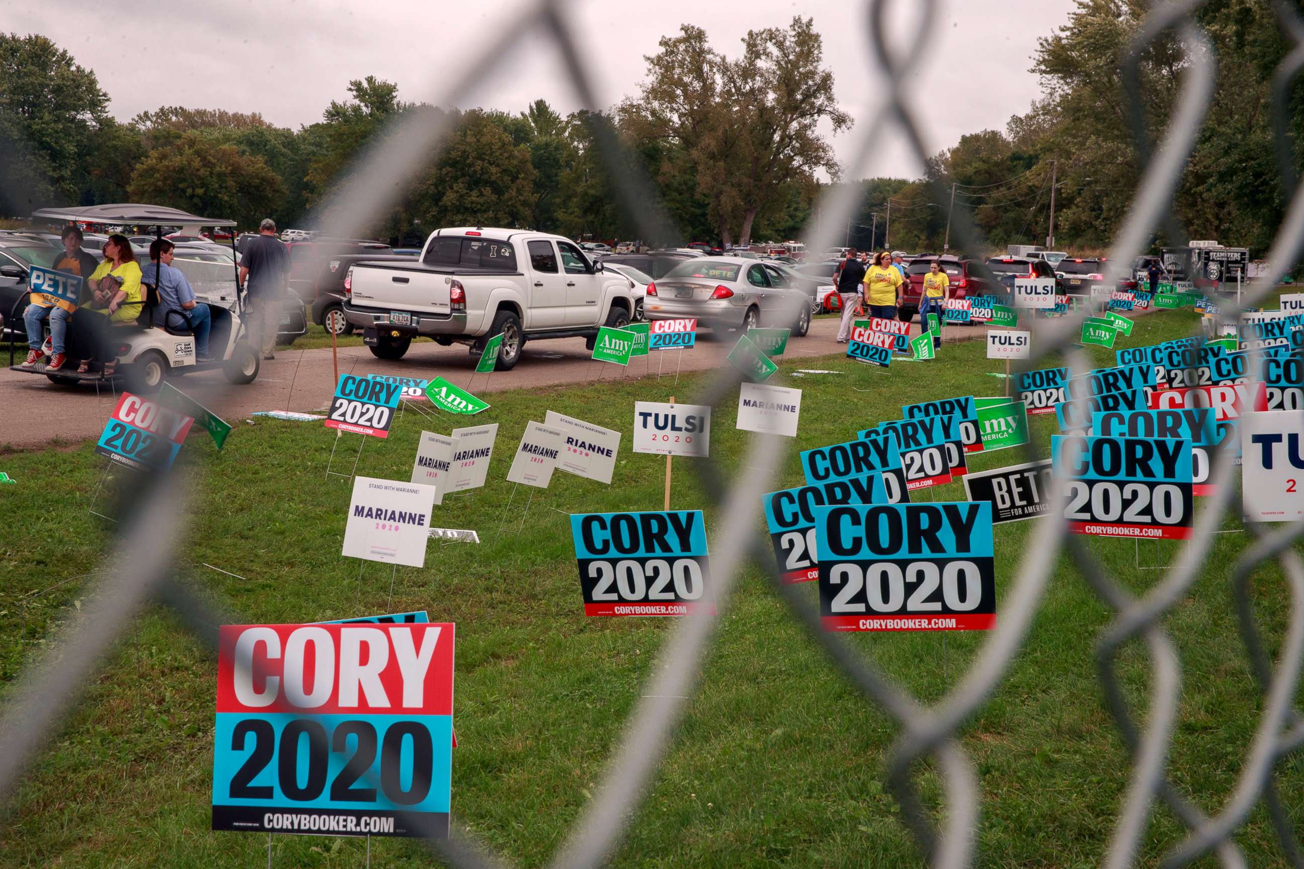 PHOTO: Campaign signs line a road during the Polk County Steak Fry in Des Moines, Iowa, Sept. 21, 2019.