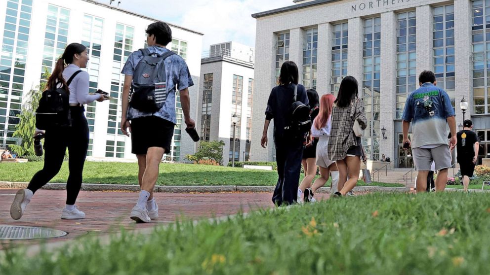 PHOTO: Students walk in the Northeastern University campus on Sept. 14, 2022 in Boston.