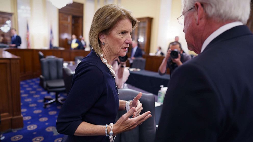 PHOTO: Sen. Shelley Moore Capito, the leader of a group of Republican senators aiming to craft a deal with President Biden on infrastructure legislation, confers with Sen. Roger Wicker at the Capitol in Washington, D.C., May 26, 2021.