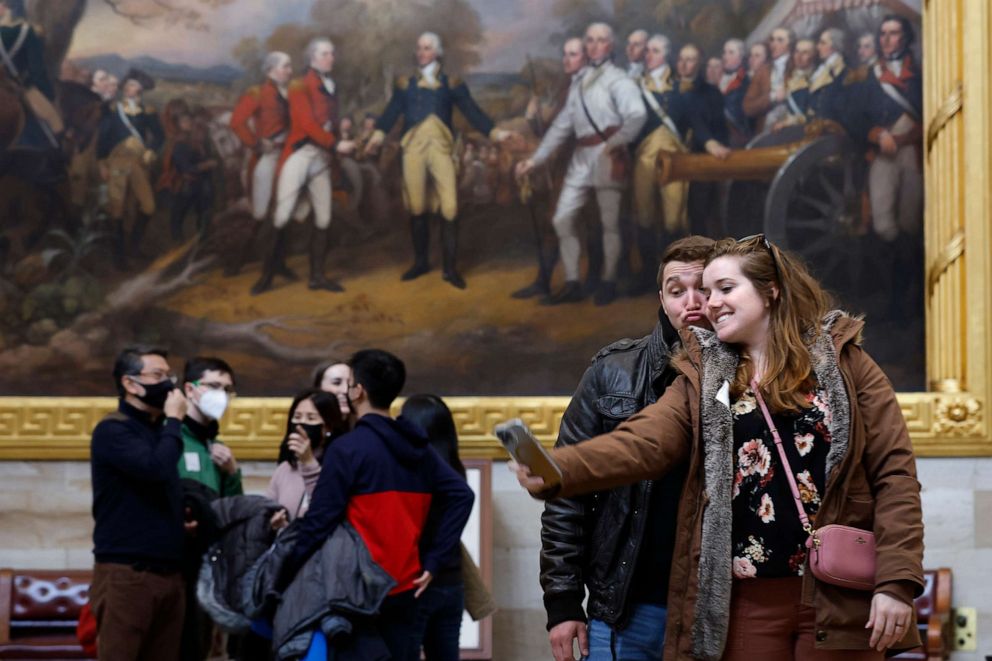 PHOTO: A couple poses for a selfie in the Capitol Rotunda on the first day that members of the pubic are able to tour the Capitol since tours were halted in 2020 due to the coronavirus pandemic, March 28, 2022.