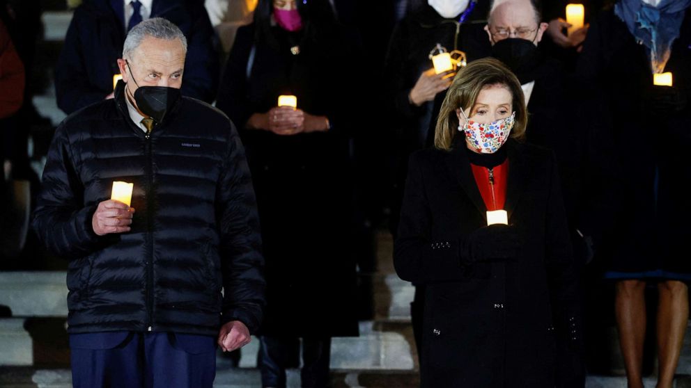 PHOTO: House Speaker Nancy Pelosi, Senate Majority Leader Chuck Schumer and members of Congress participate in a prayer vigil on the East steps of the Capitol, Jan. 6, 2022.