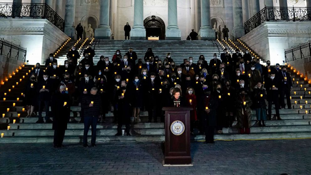 PHOTO: House Speaker Nancy Pelosi speaks as members of the House and Senate participate in a prayer vigil on the East Steps of the Capitol, Jan. 6, 2022,