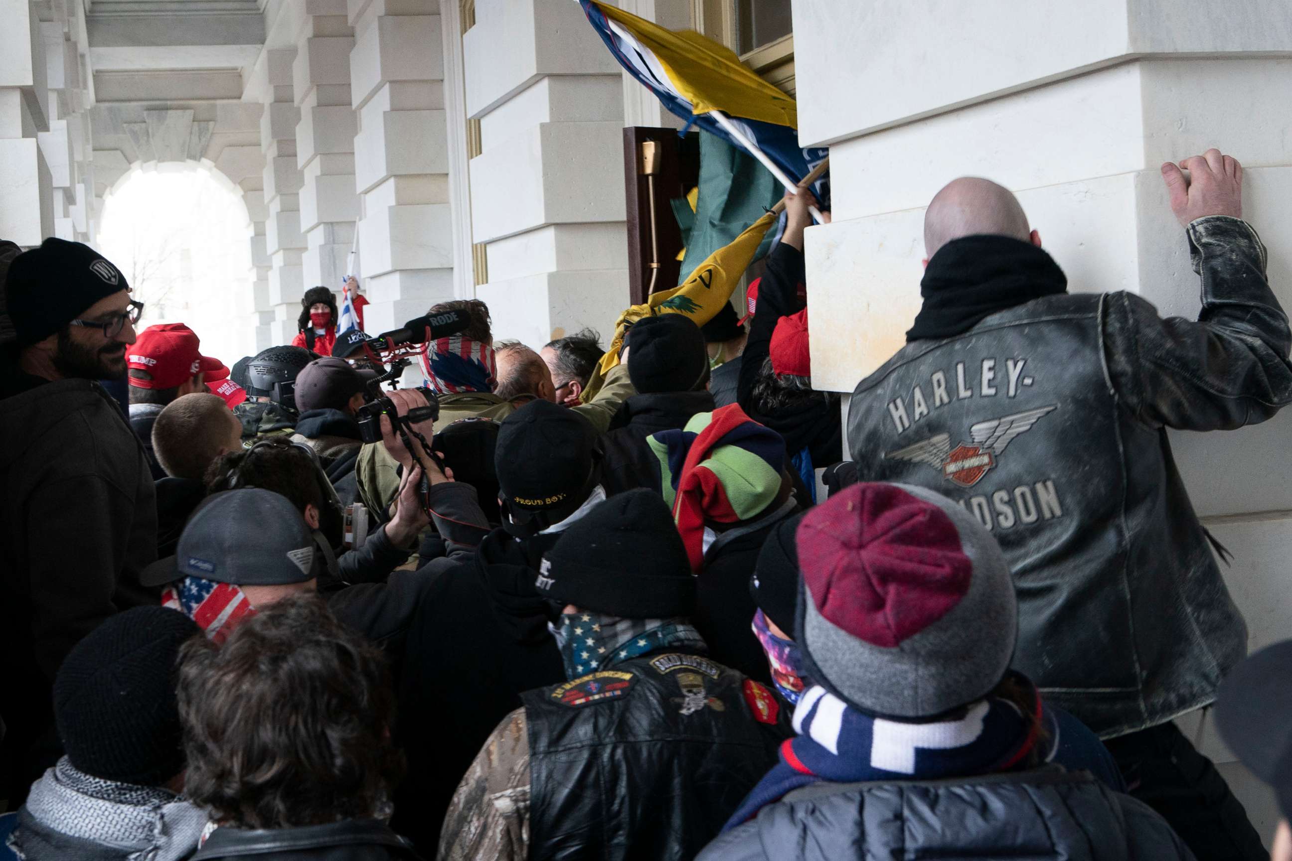 PHOTO: Insurrectionists try to open a door of the Capitol, Jan. 6, 2021. 