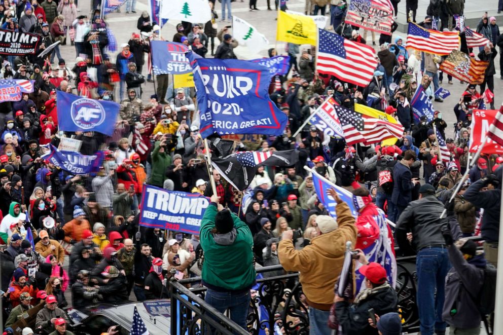 PHOTO: Rioters gather outside the U.S. Capitol in Washington, on Jan 6, 2021.