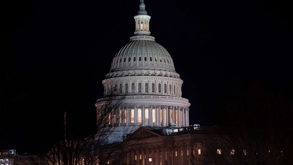 PHOTO: The Capitol is seen as the impeachment trial of President Donald Trump on charges of abuse of power and obstruction of Congress, stretches into the night, in Washington, Jan. 29, 2020.