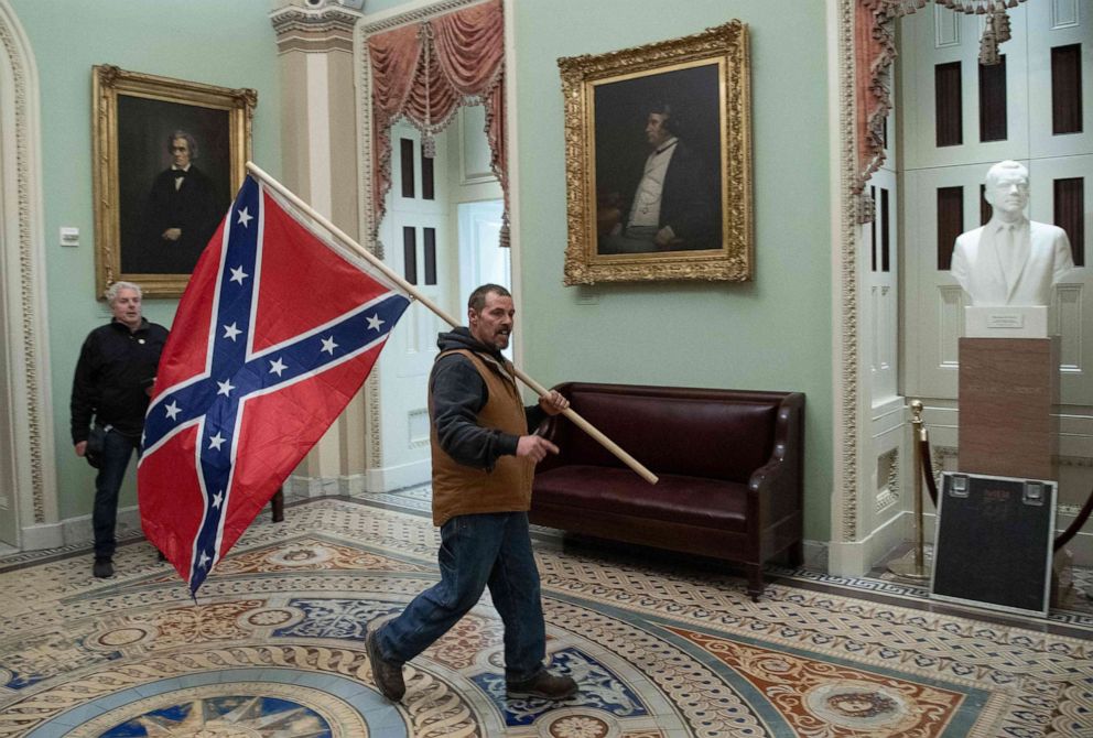 PHOTO: Supporters of President Donald Trump walk through the U.S. Capitol on Jan. 6, 2021, in Washington, D.C.