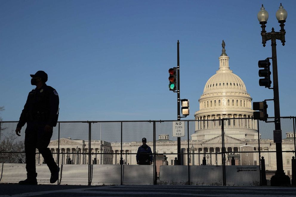 PHOTO: An eight-foot-tall steel security fence continues to encircle the U.S. Capitol on April 05, 2021 in Washington.