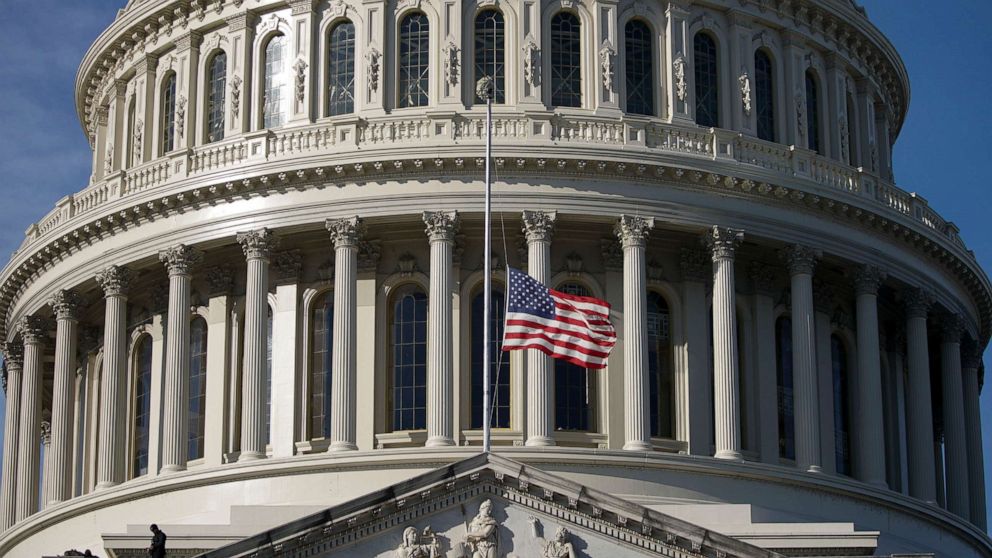 PHOTO: The American flag flies at half-staff outside the U.S. Capitol before a ceremony for former Sen. Harry Reid, Jan. 12, 2022, in Washington. 