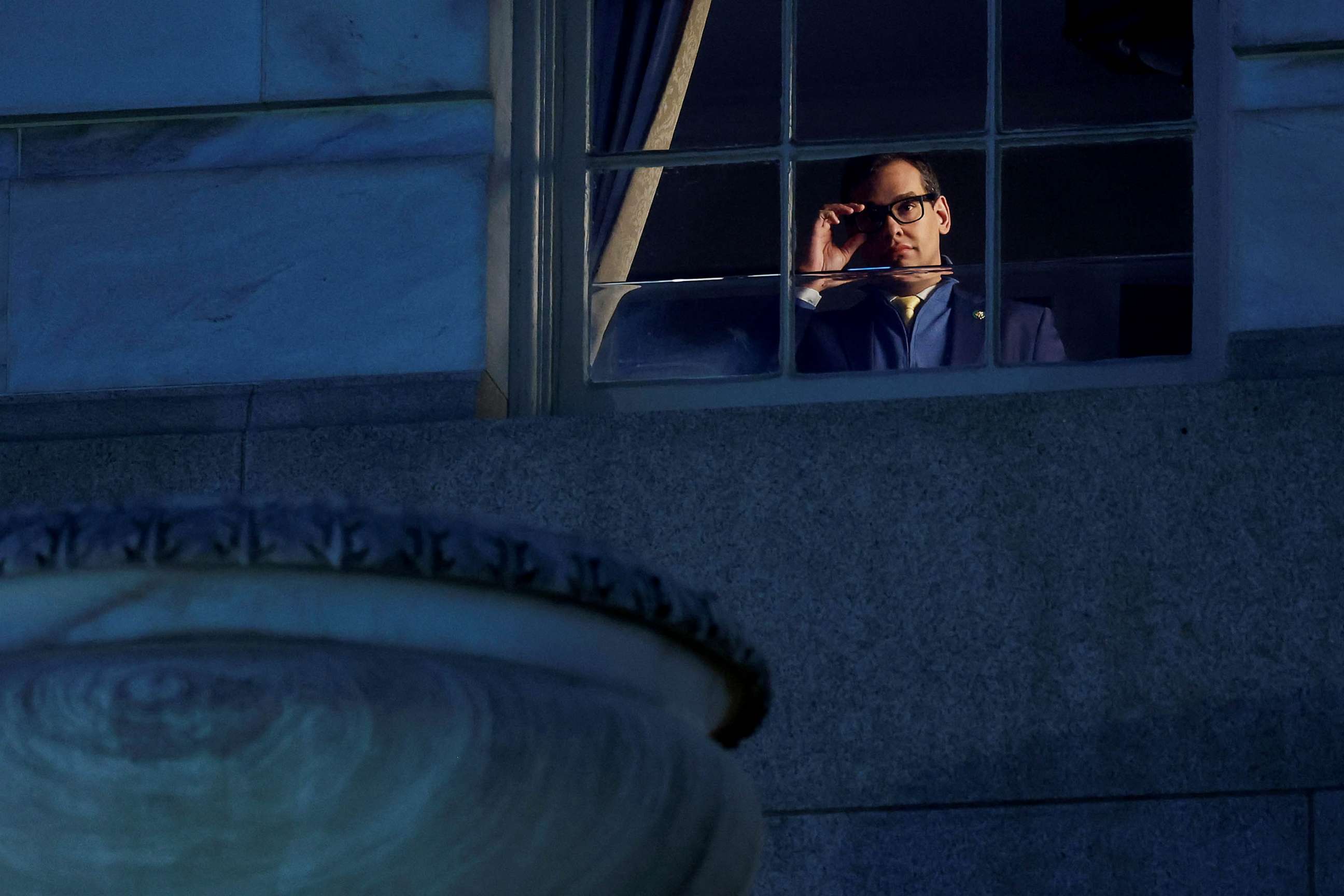 PHOTO: FILE - U.S. Representative George Santos poses for a portrait while looking out from the window of his office in the Longworth House Office Building on Capitol Hill in Washington, D.C., Feb. 28, 2023.