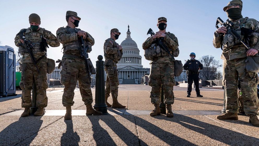 PHOTO: Members of the Michigan National Guard and the U.S. Capitol Police keep watch as heightened security remains in effect around the Capitol, in Washington, D.C., March 3, 2021.