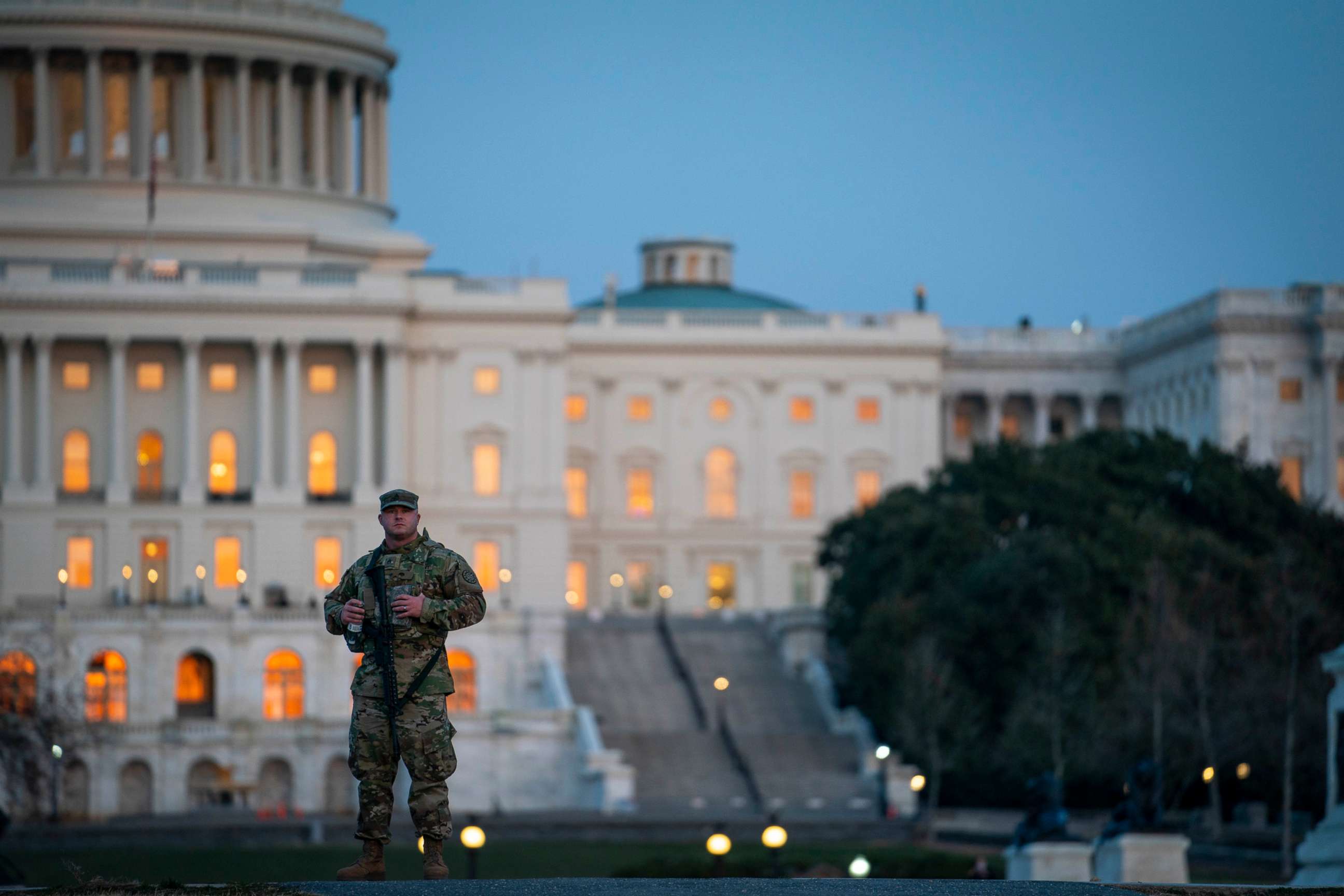 PHOTO: A member of the National Guard patrols outside of the U.S. Capitol on March 8, 2021, in Washington, D.C.
