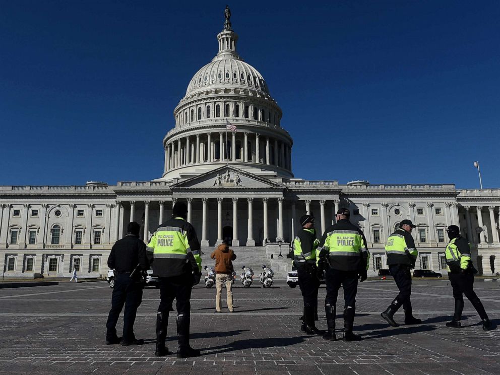 PHOTO: Capitol police officers patrol the US Capitol grounds in Washington, DC, March 5, 2021. 