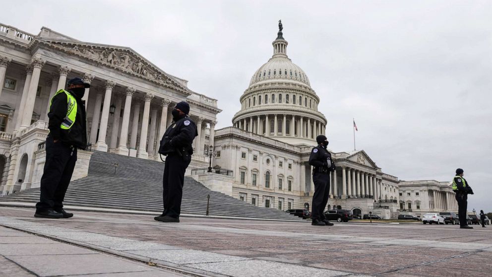 PHOTO: U.S. Capitol Police stand guard on a plaza surrounding the Capitol before Congress meets to certify the electoral college vote for President-elect Joe Biden in Washington, D.C., Jan. 6, 2021.