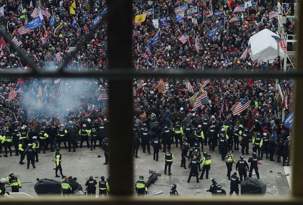 PHOTO: Police hold back supporters of US President Donald Trump as they gather outside the US Capitol's Rotunda on Jan. 6, 2021, in Washington, D.C.