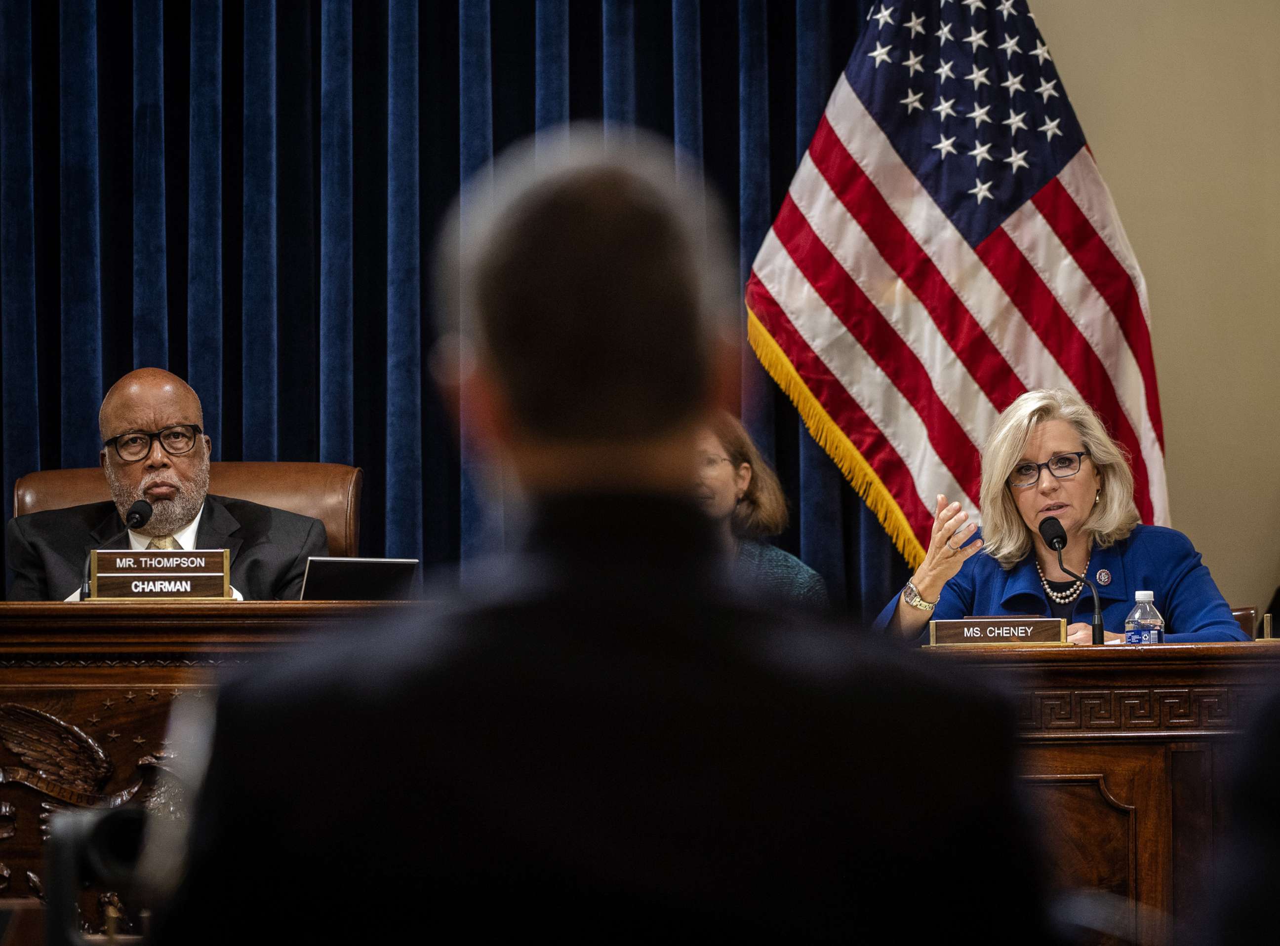 PHOTO: Rep. Liz Cheney questions MPD Officer Michael Fanone while Rep. Bennie Thompson, chairman of the Select Committee to Investigate the January 6th Attack on the U.S. Capitol, listens during a hearing in Washington, July 27, 2021.