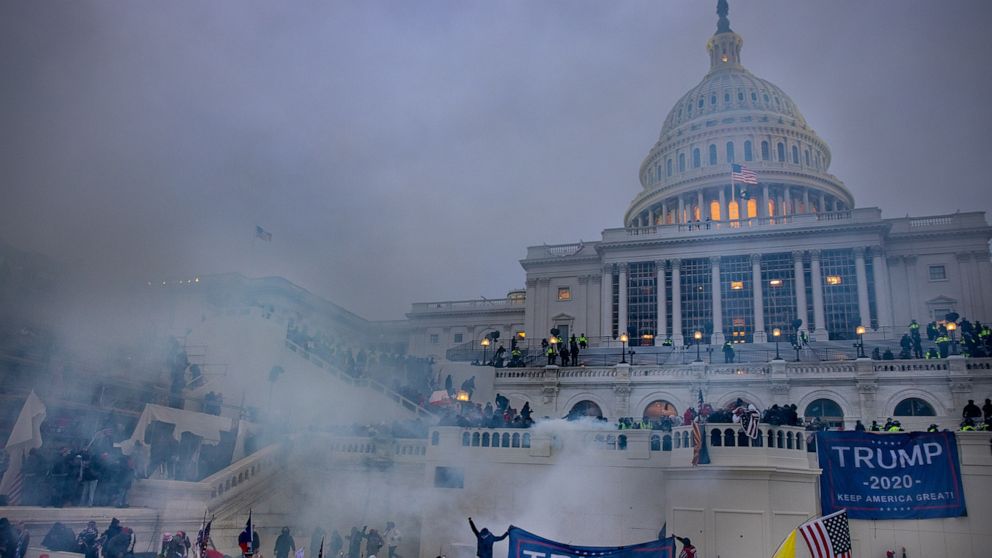 PHOTO: Tear gas is fired at supporters of President Trump who stormed the United States Capitol building in Washington, Jan. 6, 2021.