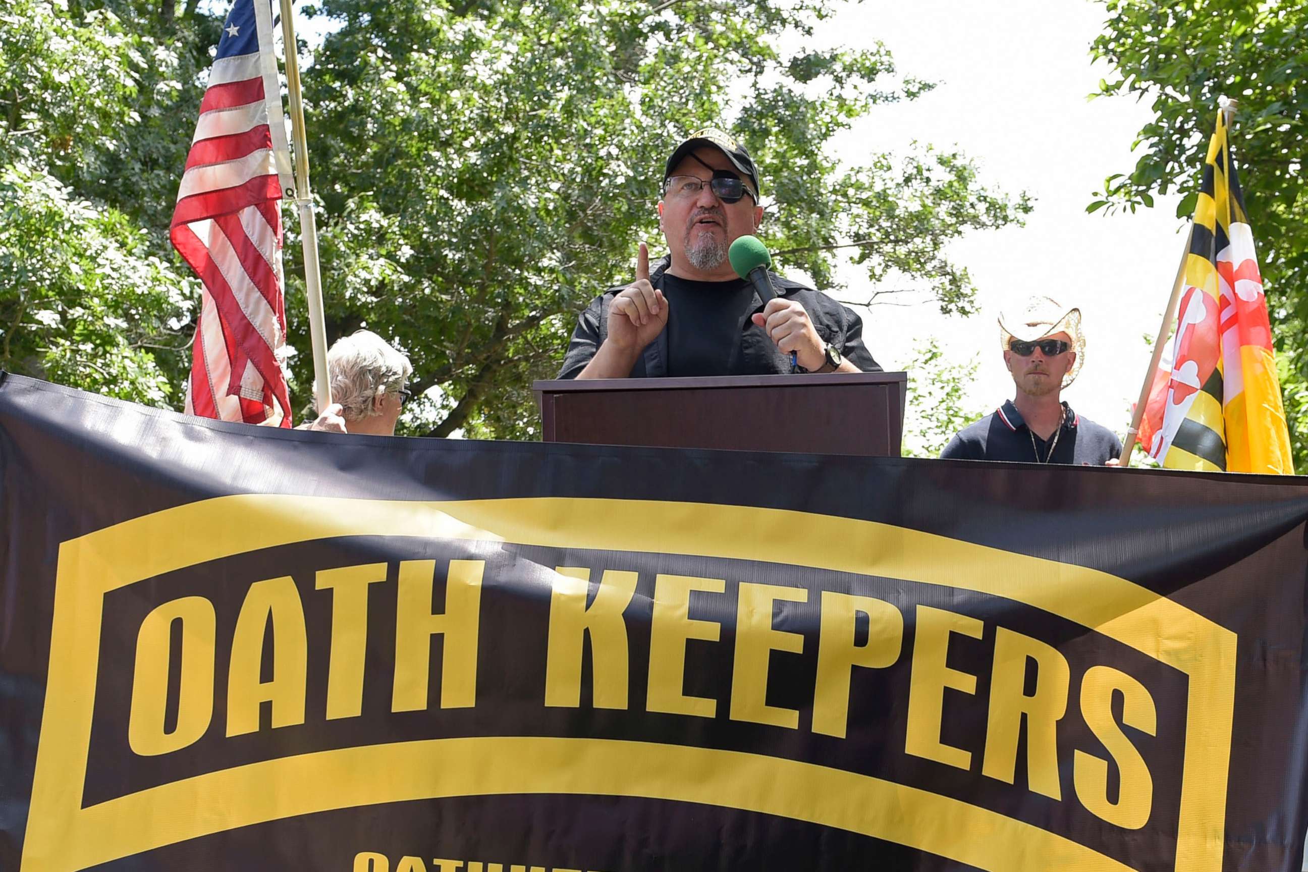 PHOTO: Stewart Rhodes, founder of the Oath Keepers, center, speaks during a rally outside the White House in Washington, June 25, 2017. 