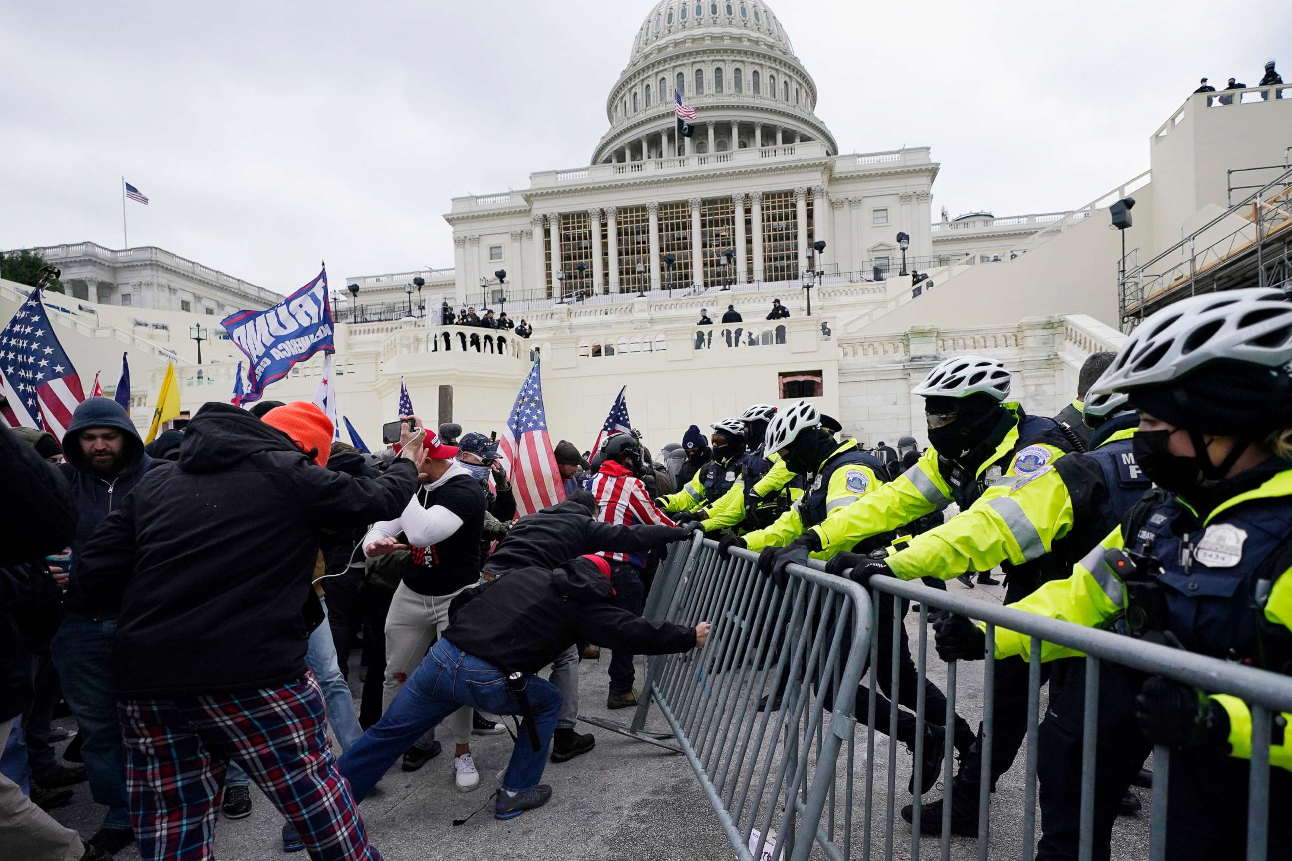 PHOTO: Rioters try to break through a police barrier at the Capitol, Jan. 6, 2021, in Washington D.C.
