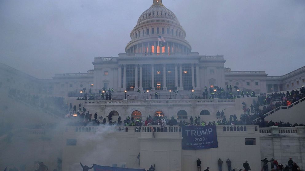 PHOTO: Police officers stand guard as supporters of President Donald Trump gather in front of the U.S. Capitol Building in Washington, D.C., Jan. 6, 2021.