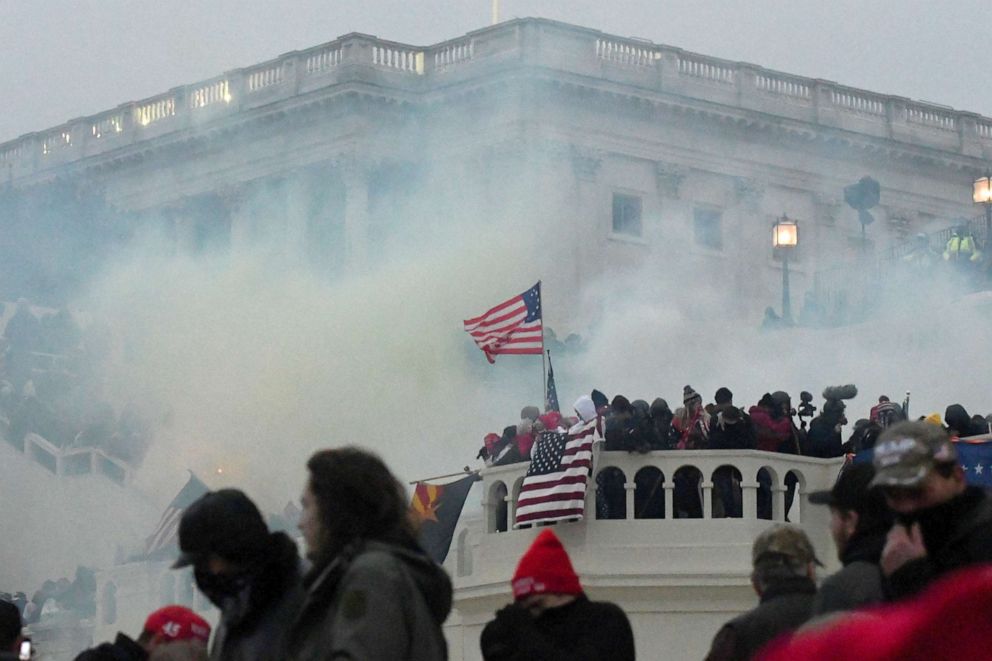 PHOTO: Police clear the U.S. Capitol Building with tear gas as supporters of President Donald Trump gather outside, in Washington, Jan. 6, 2021.