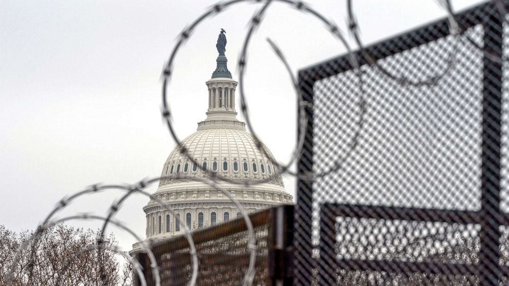 PHOTO: Razor wire tops the anti-scaling fence surrounding the perimetter of the U.S. Capitol, Feb. 11, 2021, in Washington, D.C. 