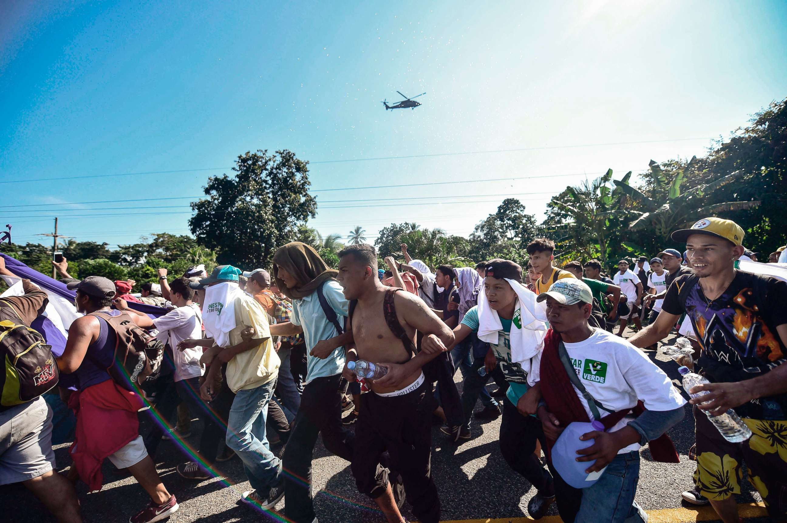 PHOTO: Honduran migrants take part in a caravan heading to the U.S., on the road linking Ciudad Hidalgo and Tapachula, Chiapas state, Mexico, Oct. 21, 2018.