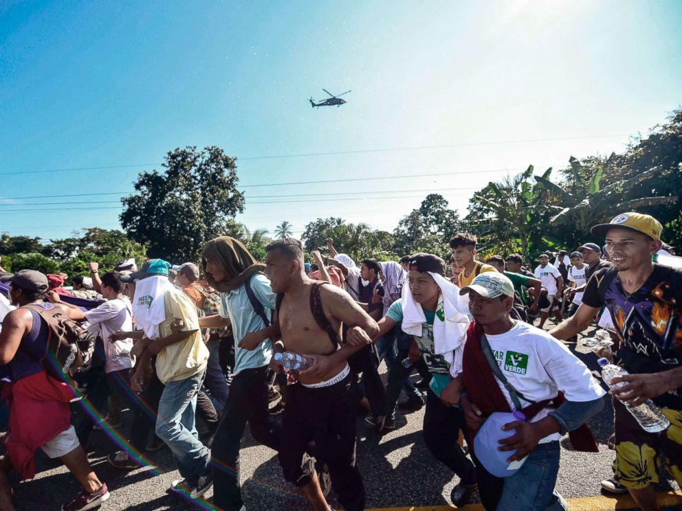 PHOTO: Honduran migrants take part in a caravan heading to the U.S., on the road linking Ciudad Hidalgo and Tapachula, Chiapas state, Mexico, Oct. 21, 2018.