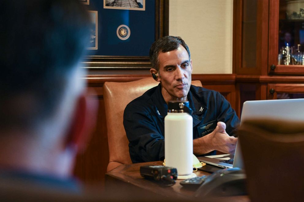 PHOTO: Capt. Carlos Sardiello, commanding officer of the aircraft carrier USS Theodore Roosevelt (CVN 71), right, talks with the families of Theodore Roosevelt Sailors during a virtual town hall, May 10, 2020.