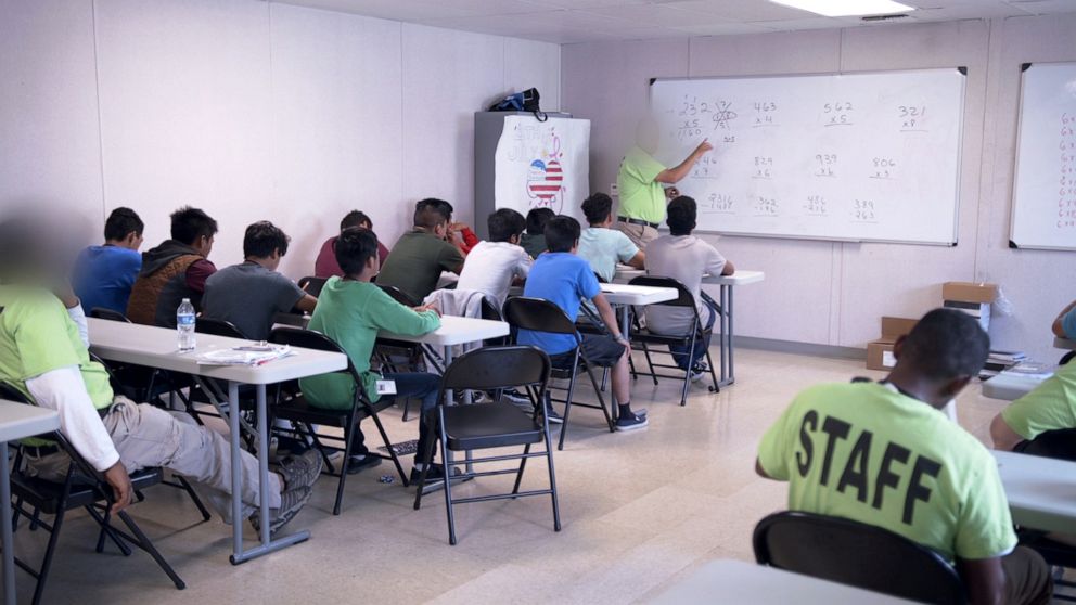 PHOTO:A teacher instructs mathematics at the U.S. Department of Health and Human Services' unaccompanied minors migrant detention facility at Carrizo Springs, Texas, July 5, 2019.