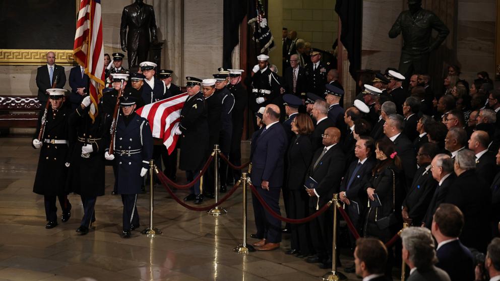 PHOTO: U.S. Military Body Bearers carry the casket bearing the remains of former President Jimmy Carter into the Capitol Rotunda during a memorial service at the U.S. Capitol, on January 07, 2025, in Washington, DC. 