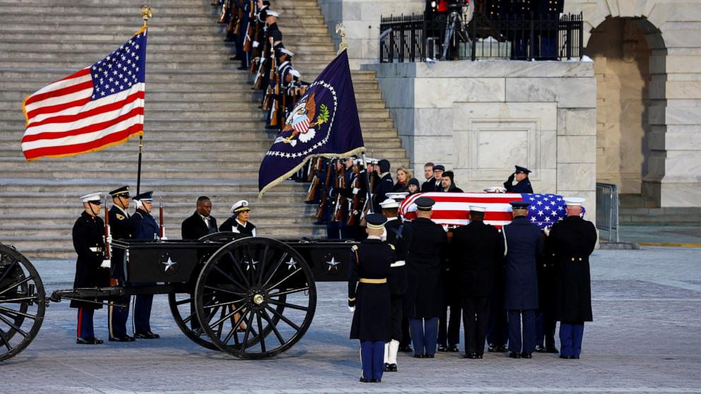 PHOTO: The casket of Jimmy Carter, the former president who died on December 29 at the age of 100, is carried by a body bearer team, to lie in state at the U.S. Capitol building in Washington, Jan. 7, 2025.