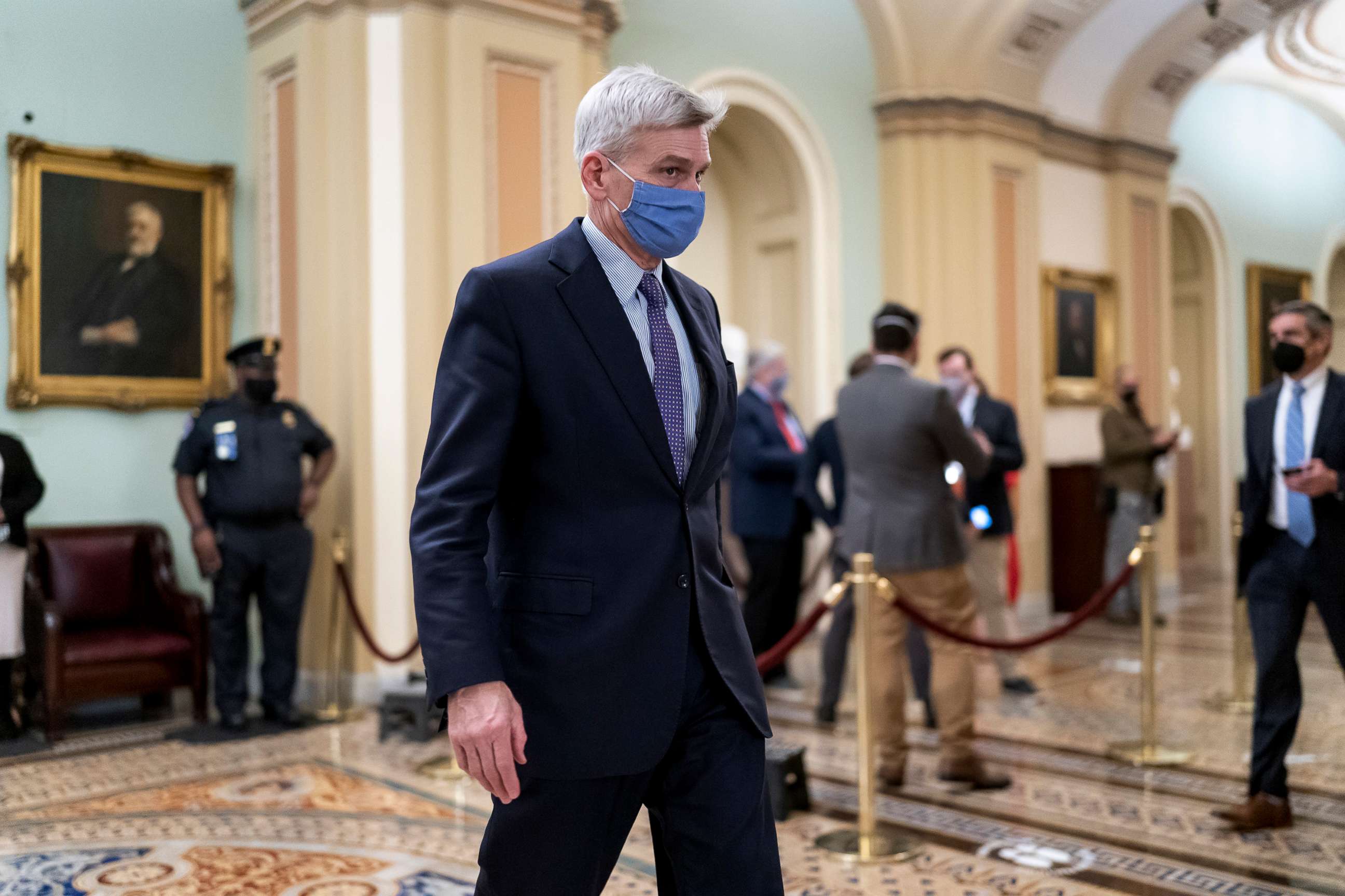 PHOTO: Sen. Bill Cassidy leaves the chamber as the Senate voted to consider hearing from witnesses in the impeachment trial of former President Donald Trump, at the Capitol in Washington, D.C., Feb. 13, 2021.