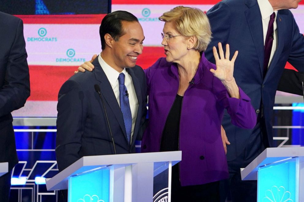 PHOTO: Julian Castro and Sen. Elizabeth Warren (D-Mass.) speak after the first night of the Democratic presidential debates in Miami, June 26, 2019.