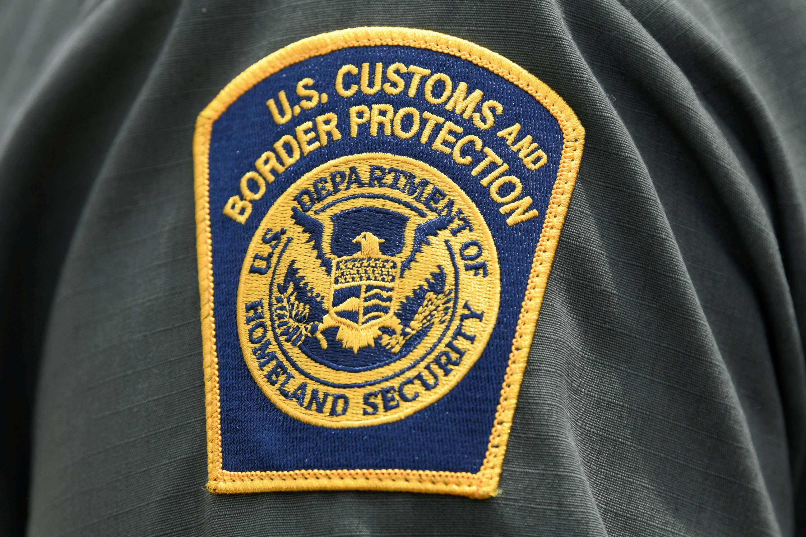 PHOTO: A U.S. Customs and Border Protection patch is seen on the arm of a U.S. Border Patrol agent in Mission, Texas, July 1, 2019.