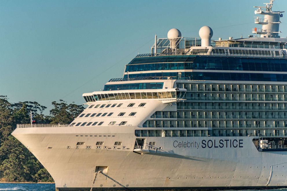 PHOTO: The Celebrity Solstice cruise ship seen approaching towards Sydney Harbour for restocking and refueling before leaving Australian waters, April 4, 2020, in Sydney, Australia. 